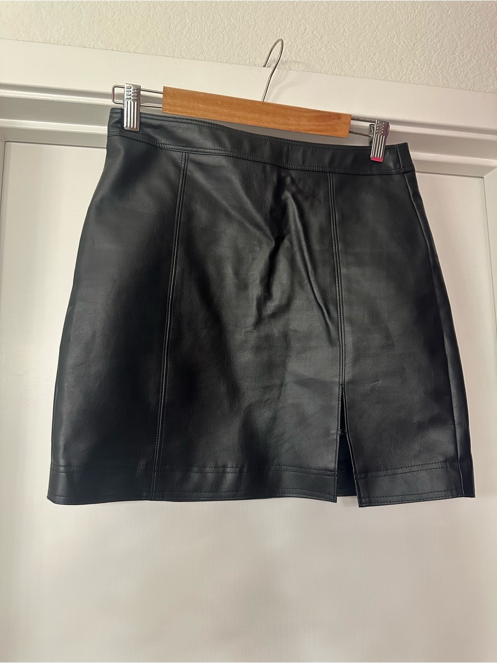 Minimalist Black Faux Leather Mini Skirt with Front Vent